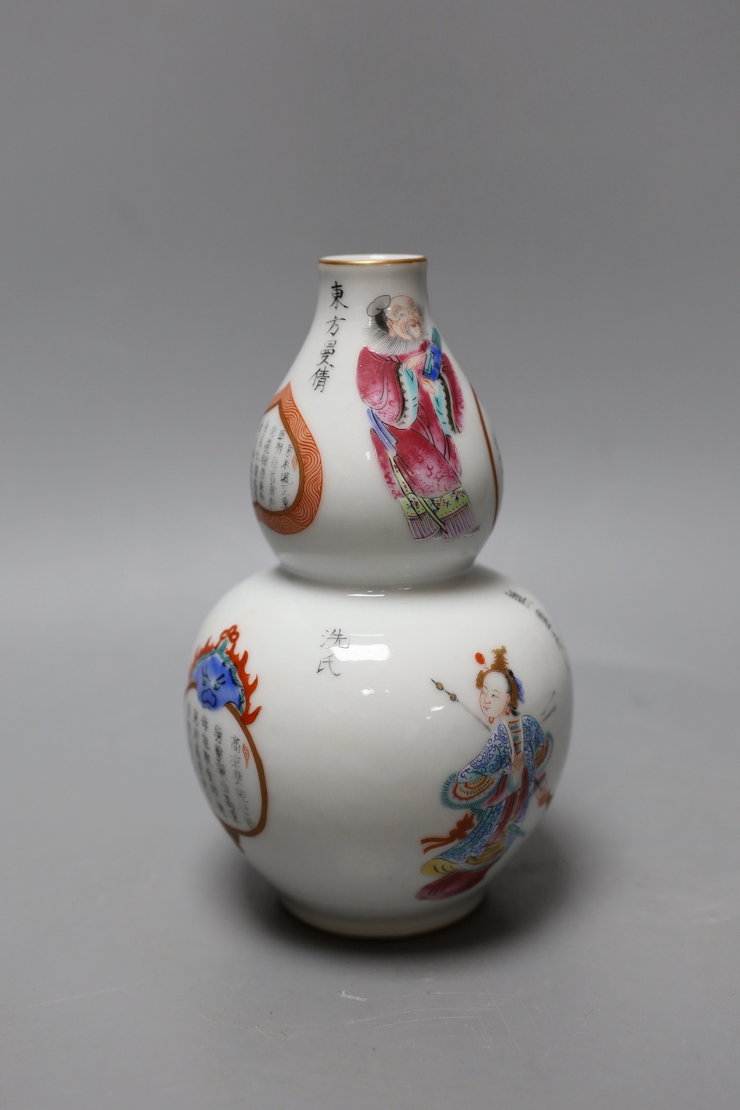 A Chinese famille rose gourd vase. 18cm high